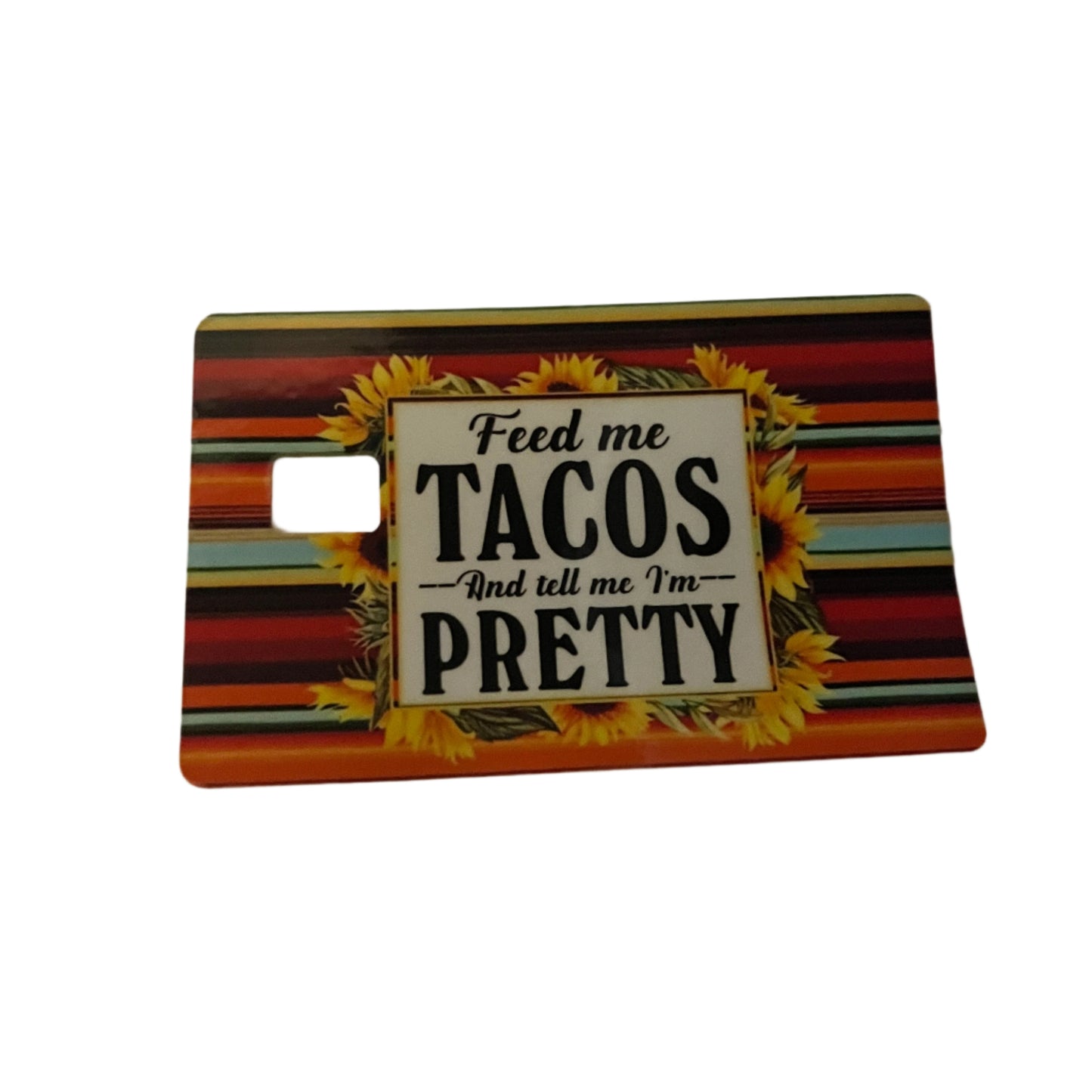 Card with 'Feed me TACOS And tell me I'm PRETTY' text on a colorful striped background