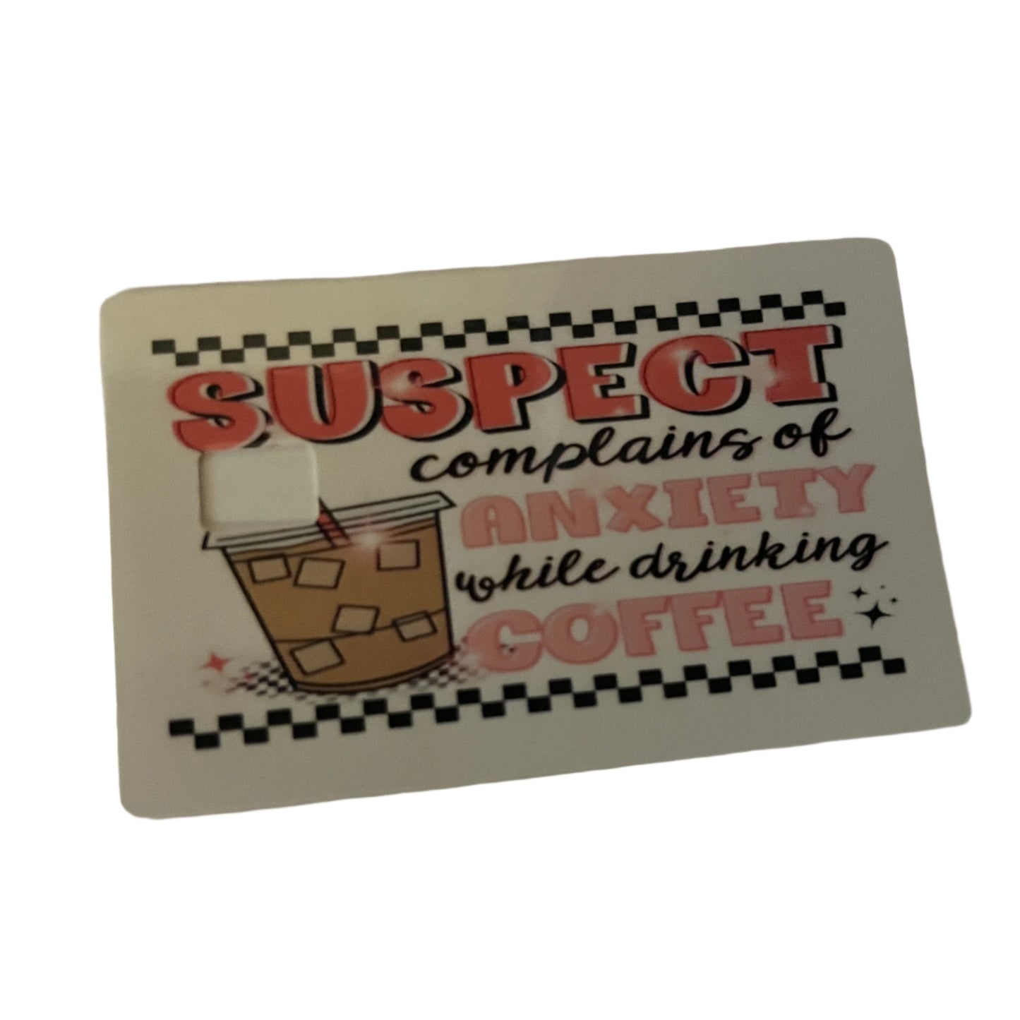 Card with text 'Suspect complains of anxiety while drinking coffee' on a white background