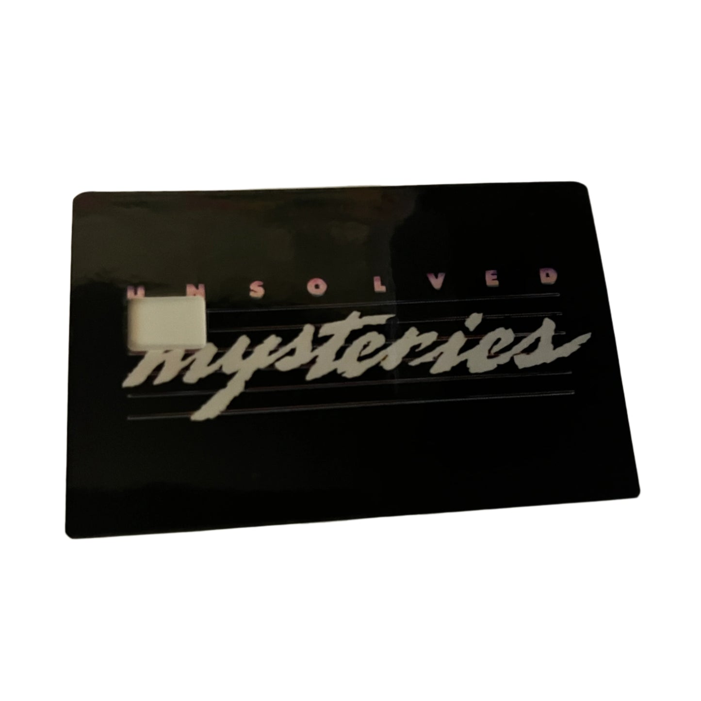 Black card with 'Unsolved Mysteries' text