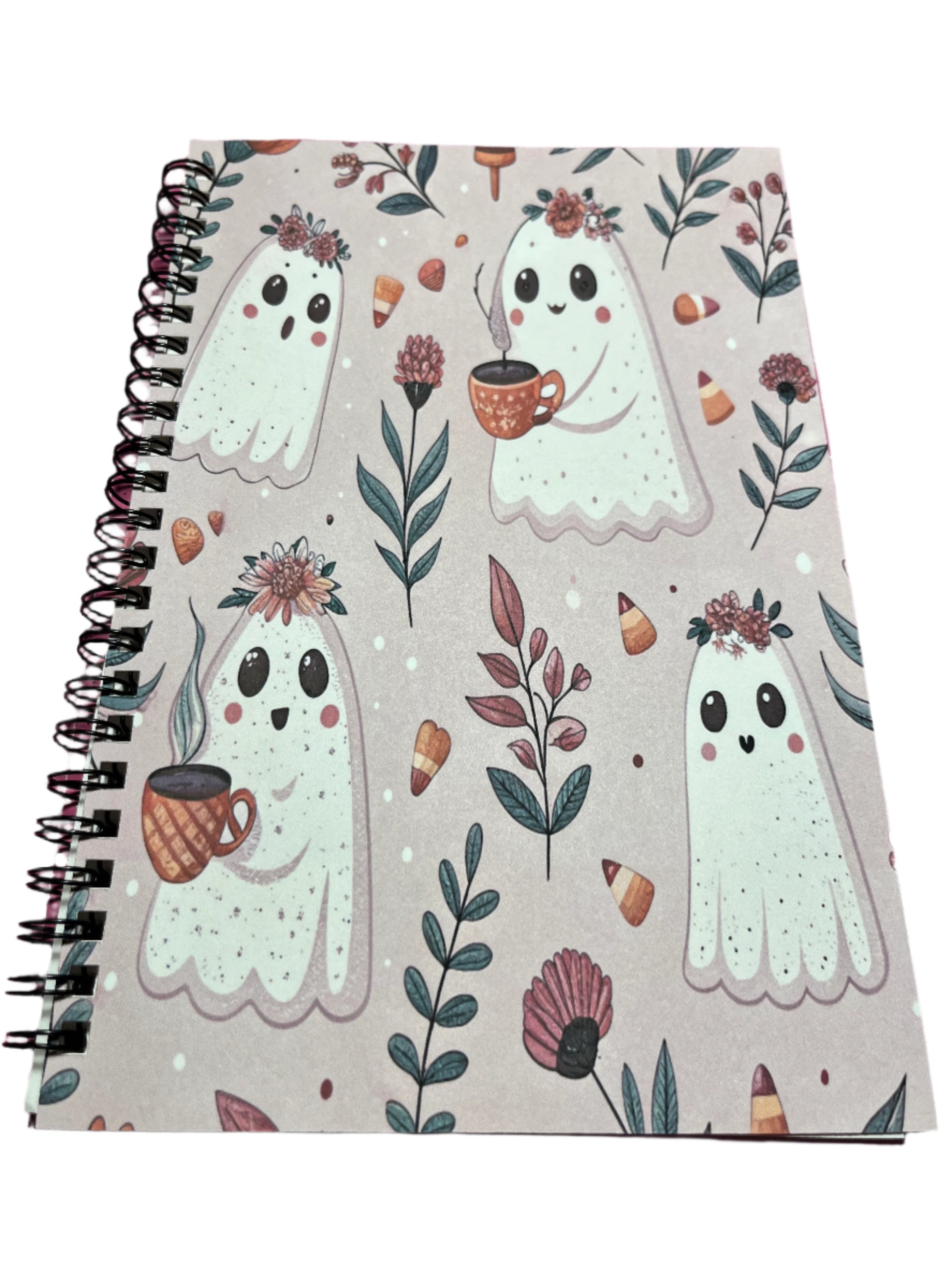 Notebook with ghost illustrations and floral patterns 
